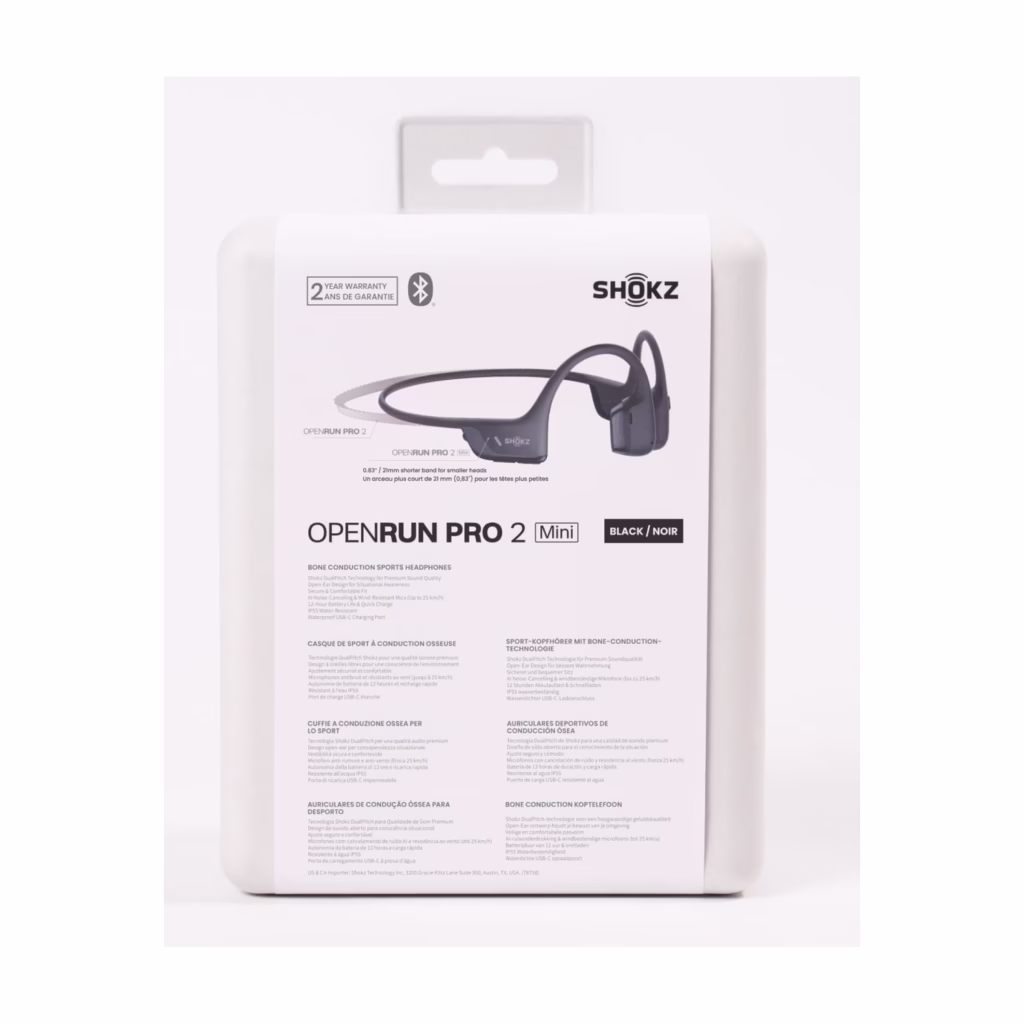 Shokz OpenRun Pro 2 Mini side profile showing open-ear comfort fit and reflective strip