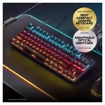 SteelSeries Apex 9 TKL on RGB gaming desk with GameSpot Best Compact Gaming Keyboard award badge