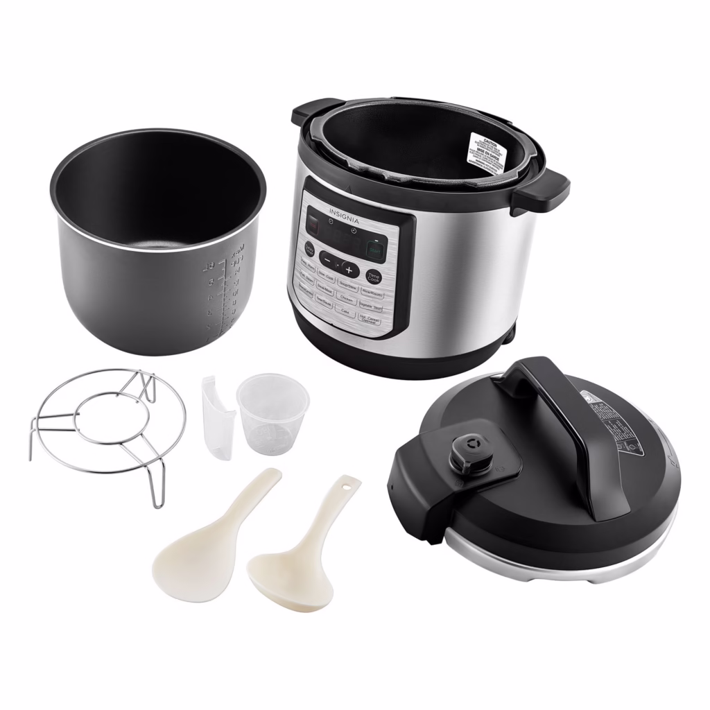 Insignia Pressure Cooker 8 QT NS-MC80SS9 with inner pot, lid, steam rack, measuring cup and serving spoons