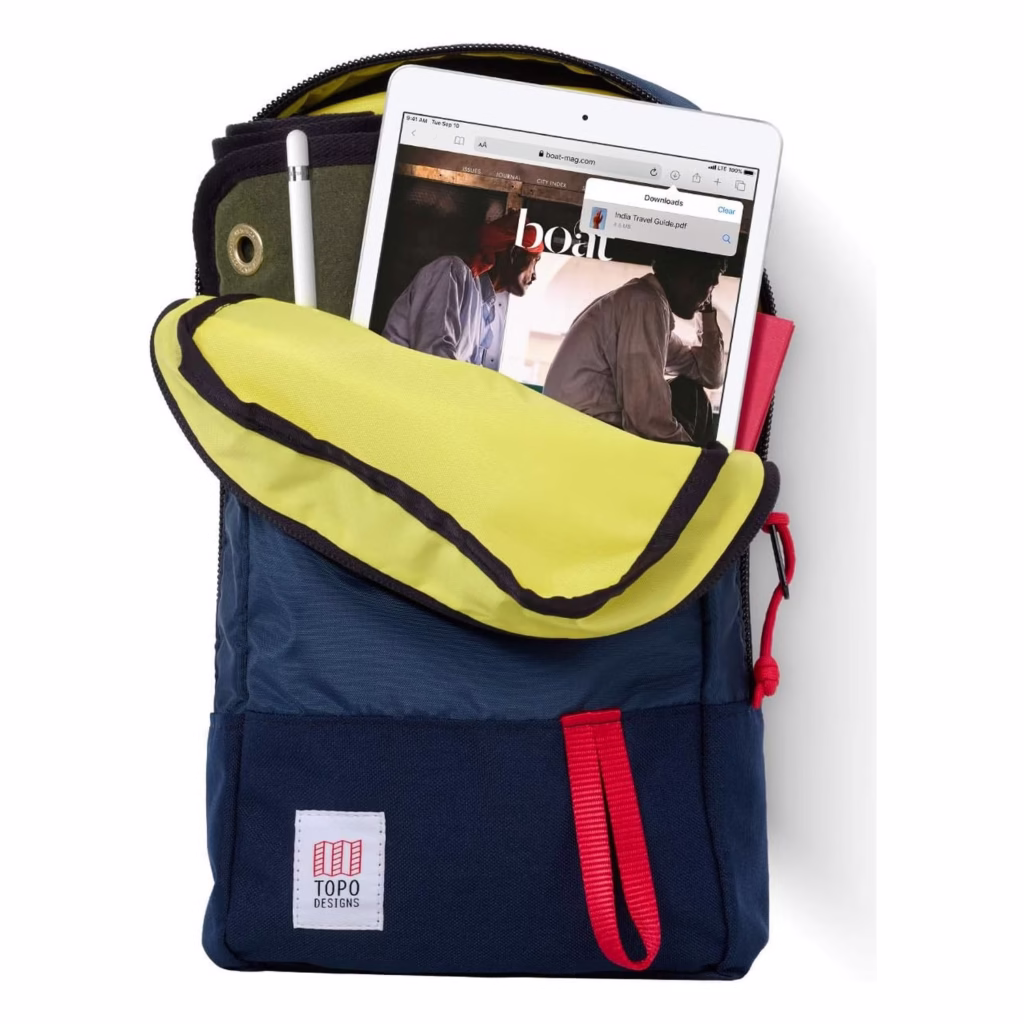 Apple iPad 7th Gen Silver and Apple Pencil packed in a backpack for school and travel