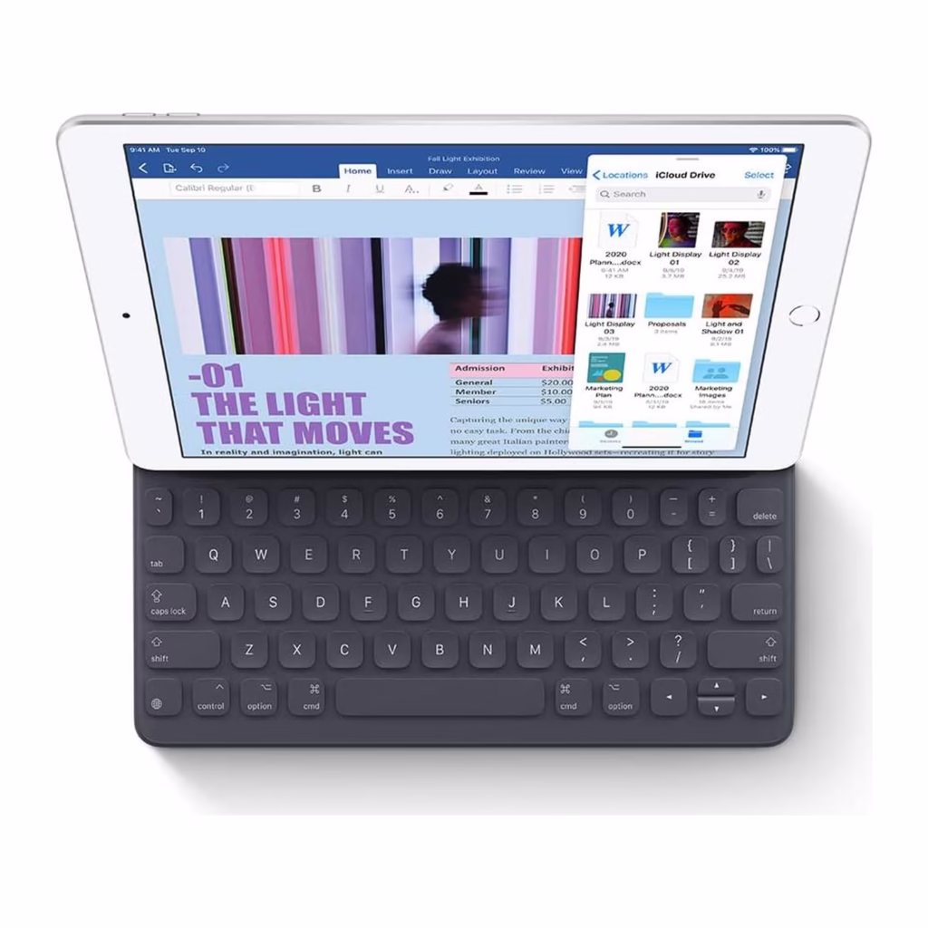 Apple iPad 7th Gen Silver docked to a Smart Keyboard through the Smart Connector