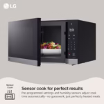 LG MSER1590C microwave Sensor Cook feature, door open with a dish of vegetables on the turntable