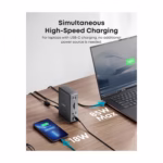 Anker 575 dock charging a laptop at 85W and a phone at 18W at the same time