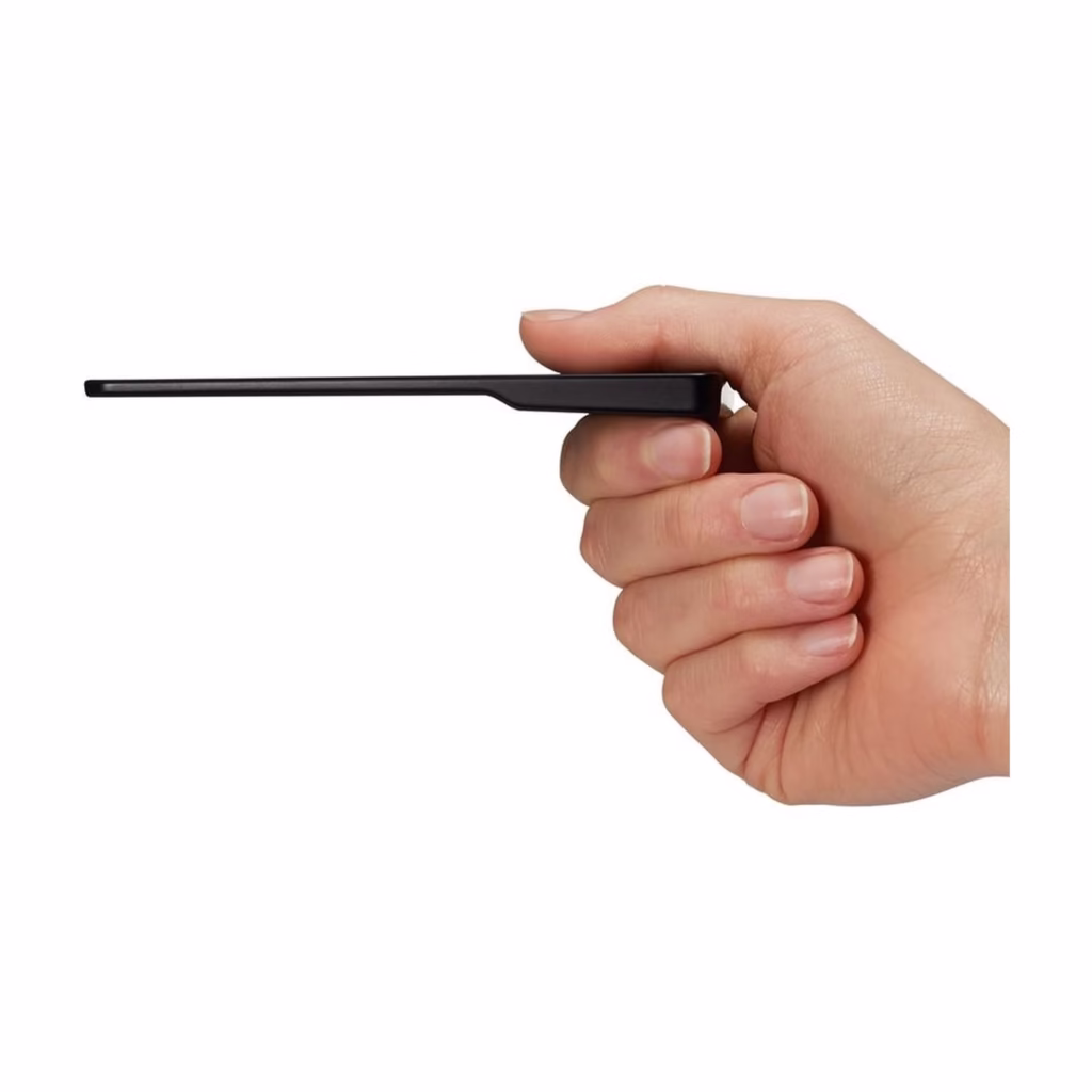 Kindle Oasis 8th Gen e-reader held in one hand showing the tapered ergonomic handgrip