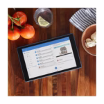 Fire HD 10 tablet in use on a kitchen counter showing a recipe