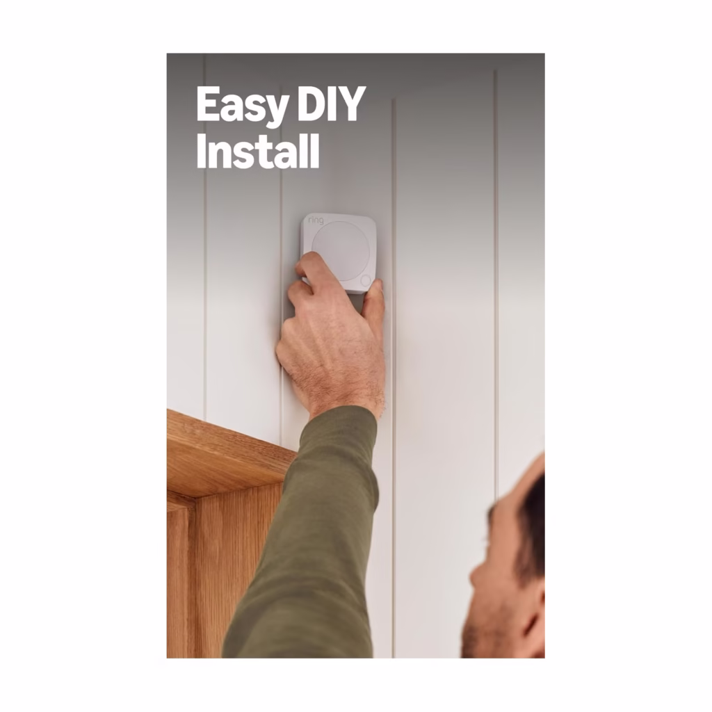 Ring Alarm contact sensor being installed on a door frame without tools