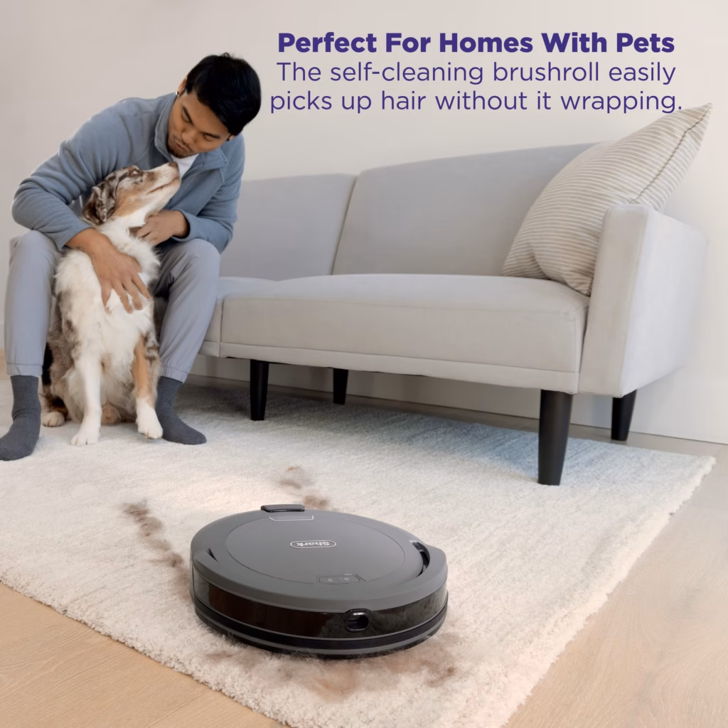 Shark Navigator RV2120AECA picking up pet hair in a home with a dog