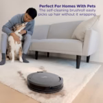 Shark Navigator RV2120AECA picking up pet hair in a home with a dog