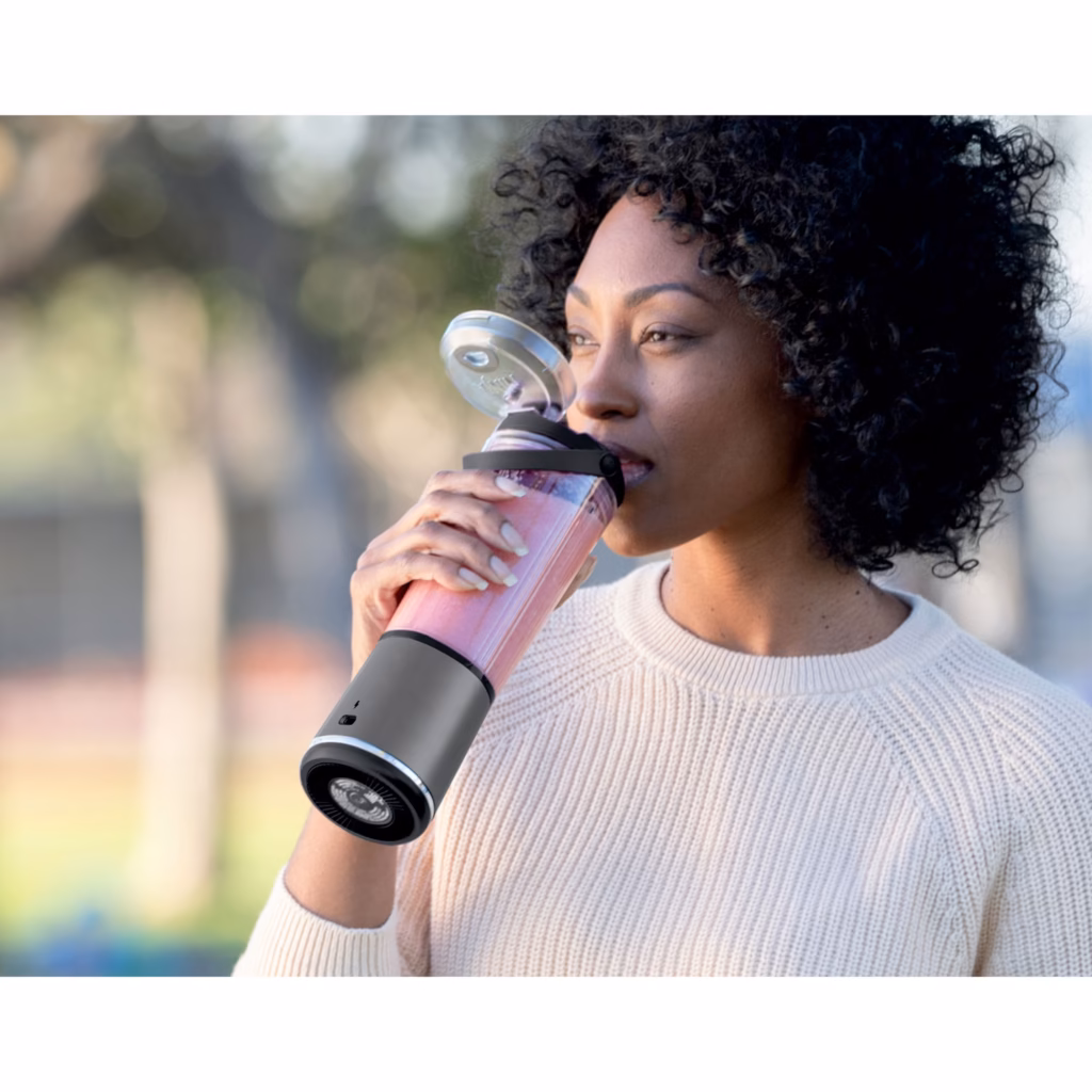 Drinking a smoothie straight from the easy-open sip lid of the Ninja Blast BC151BKC