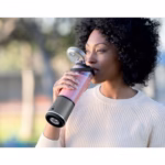 Drinking a smoothie straight from the easy-open sip lid of the Ninja Blast BC151BKC