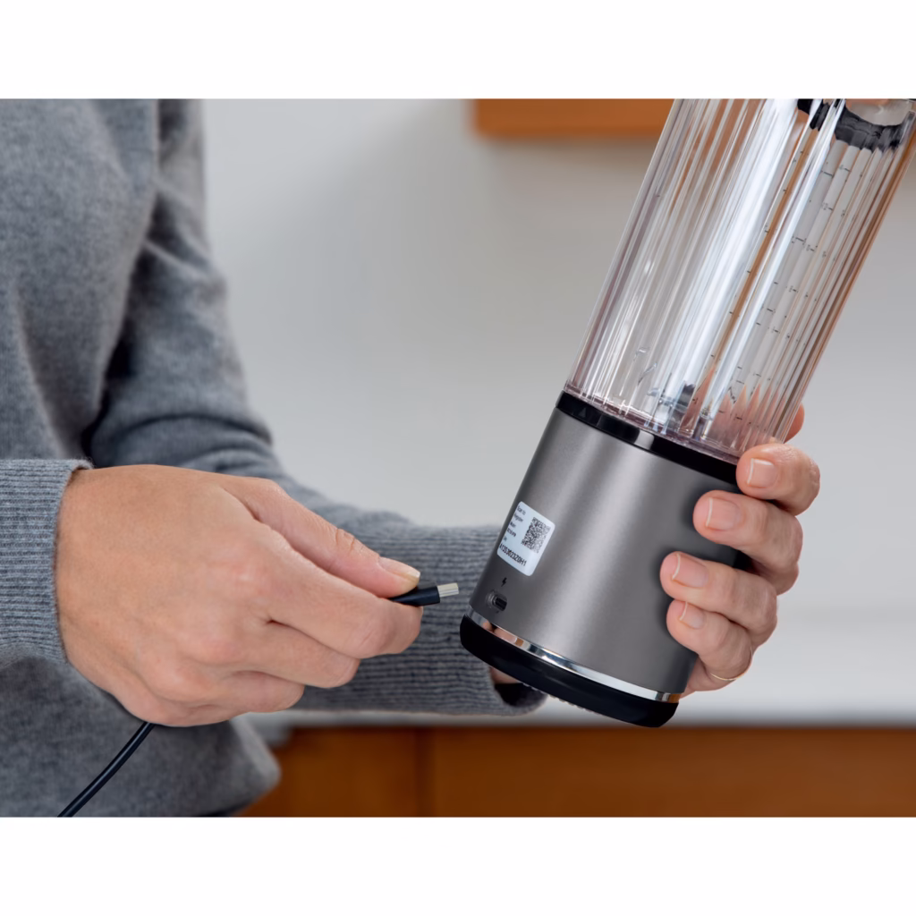 Ninja Blast BC151BKC blender base being charged with a USB-C cable