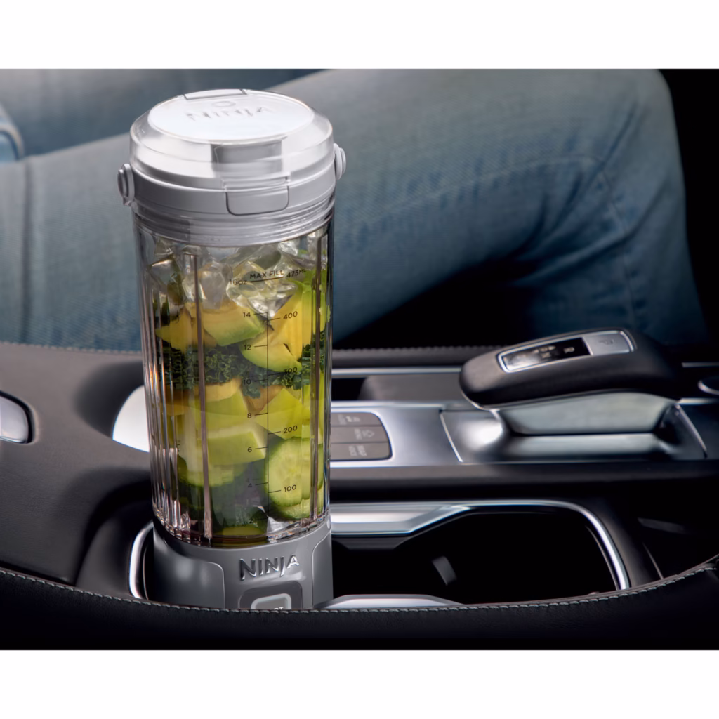 Ninja Blast BC151WHC portable blender standing in a car cupholder