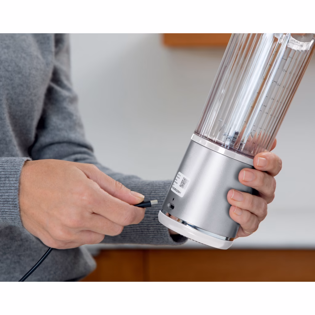 Ninja Blast BC151WHC blender base being charged with a USB-C cable