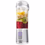 Ninja Blast BC151WHC blender vessel filled with layered berries, banana and greens