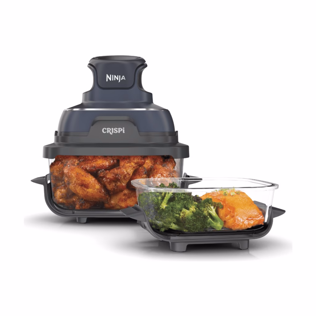 Ninja Crispi glass air fryer cooking system with food in both TempWare containers