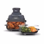 Ninja Crispi glass air fryer cooking system with food in both TempWare containers