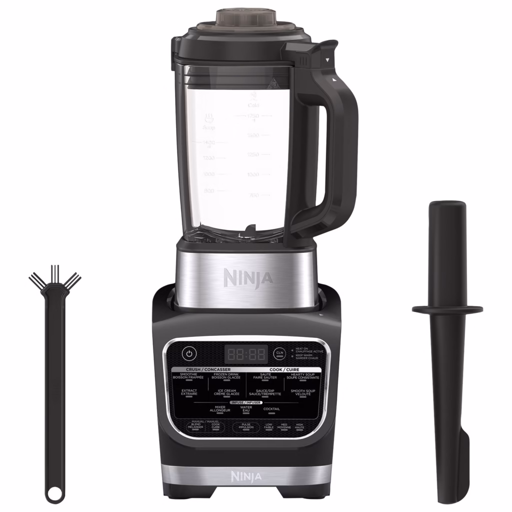 Ninja HB150C blender with its tamper and cleaning brush laid out beside the pitcher