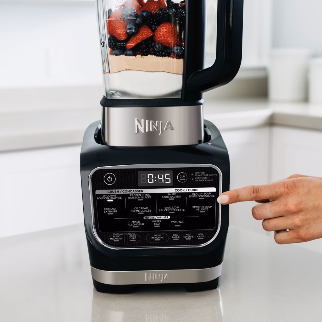 Ninja HB150C control panel close-up showing the Auto-iQ Crush, Cook and Infuse programs