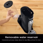 Ninja PB040C 56 oz water reservoir being pulled away from the side of the coffee maker