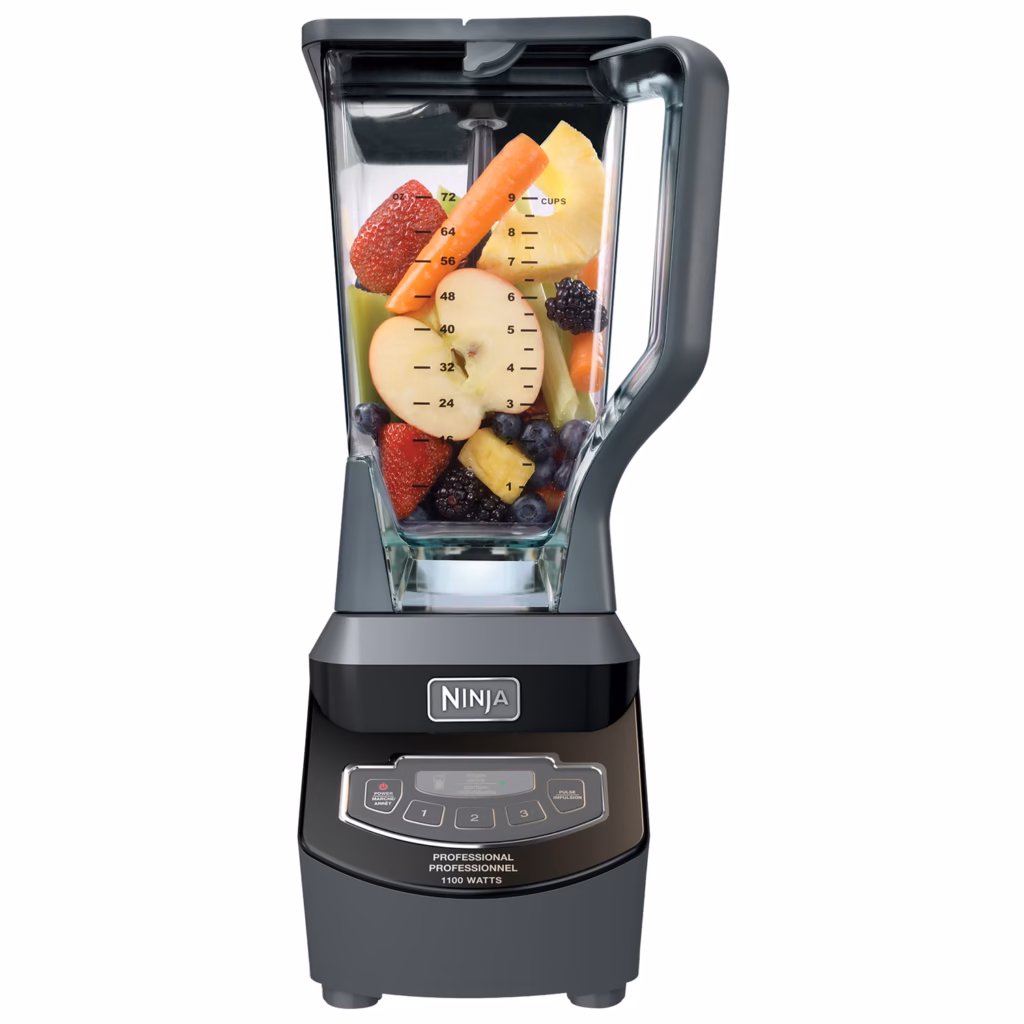 Ninja BL661BBYC 72 oz Total Crushing pitcher loaded with whole fruit and ice on the motor base