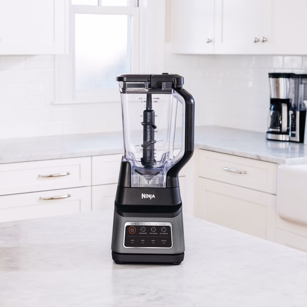 Ninja BN701C Professional Plus blender standing on a white marble kitchen counter