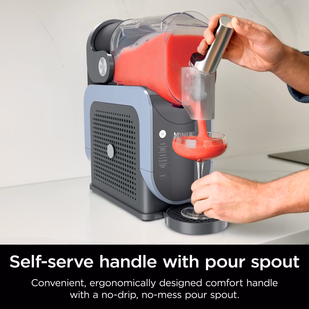 Ninja SLUSHi self-serve comfort handle and anti-drip pour spout filling a glass
