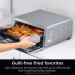 Ninja SP151C air frying a basket of chicken wings for lower fat results