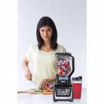 Nutri Ninja Duo BL641C blender on a kitchen counter during food prep