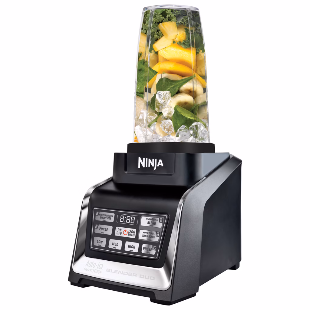 Nutri Ninja Duo BL641C single-serve cup blending pineapple and ice on the 1300W motor base