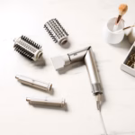 Shark FlexStyle hair dryer and styling attachments laid out on a marble counter