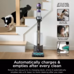 Shark PowerDetect IP3251C docked beside a staircase, showing hands-free emptying into the 2 L base