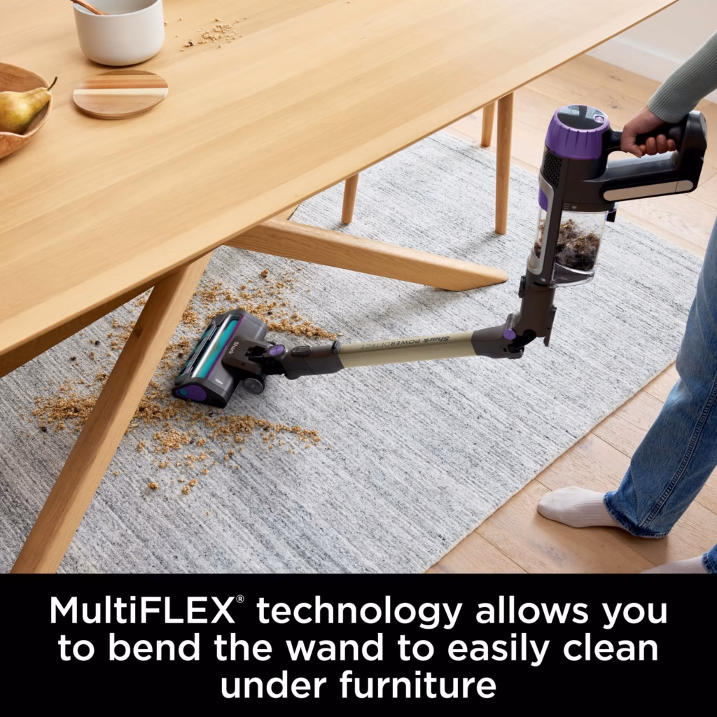 Shark PowerDetect IP3251C with the MultiFLEX wand bent to reach under a dining table