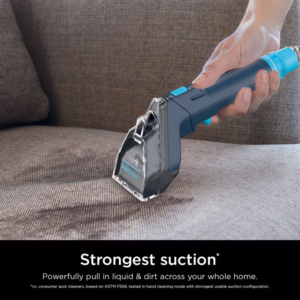 Shark StainStriker PX200C pulling liquid and dirt out of a couch cushion
