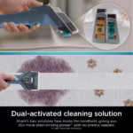 Shark StainStriker PX200C mixing its two cleaning formulas inside the handheld to lift a carpet stain